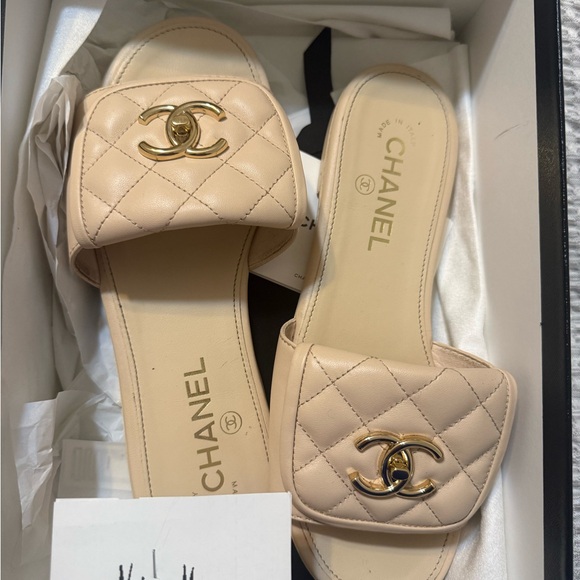 CHANEL Shoes - CHANEL Beige Quilted Slide Sandals